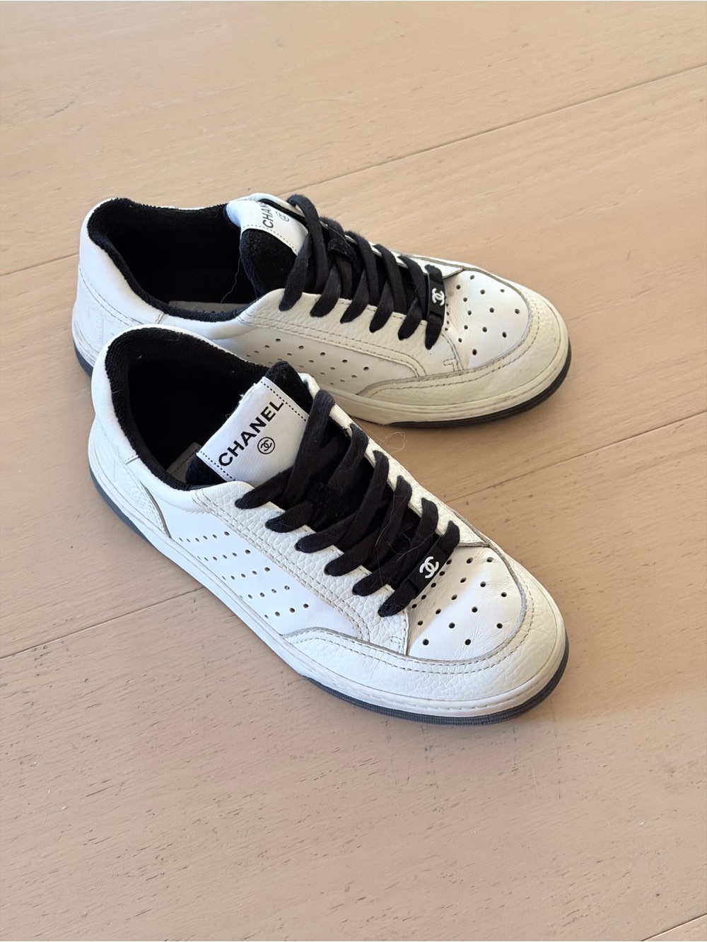 CHANEL White & Black Interlocking CC Logo Leather Sneakers
